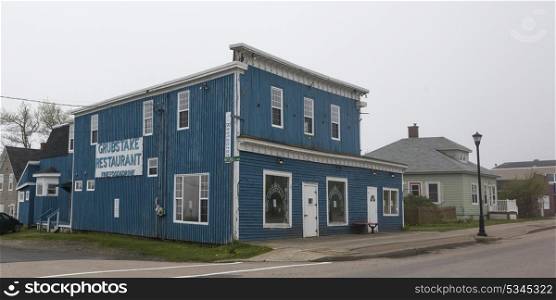 Buildings along street in town, Louisbourg, Cape Breton Island, Nova Scotia, Canada