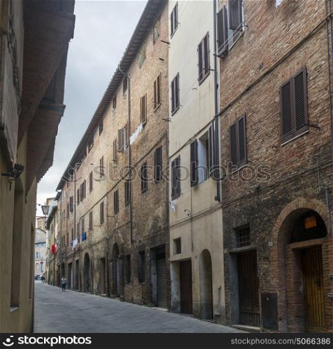 Buildings along street, Siena, Tuscany, Italy