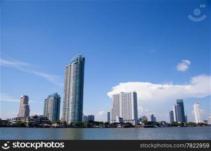 Buildings along the river. Many of the buildings and condos and office buildings. The Chao Phraya River, Thailand