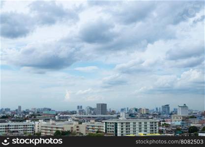 Buildings and high-rise buildings in Bangkok during the day. Cloudy skies during the day.