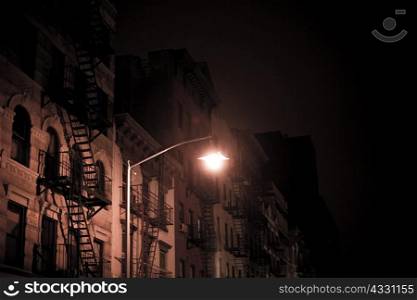 Buildings and streetlight at night
