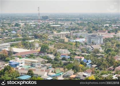 Buildings and towers in Phetchaburi taken from a high angle panoramic view of the city.
