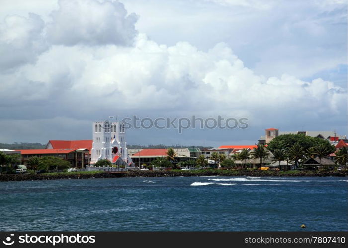 Buildings and white church in Apia, Samoa