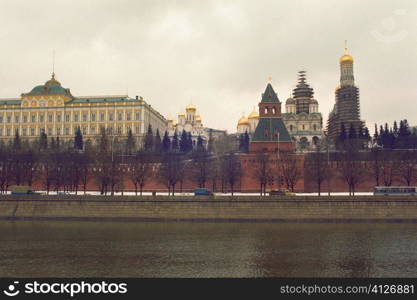 Buildings at the waterfront, Bell tower of Ivan The Great, Kremlin, Moscow, Russia