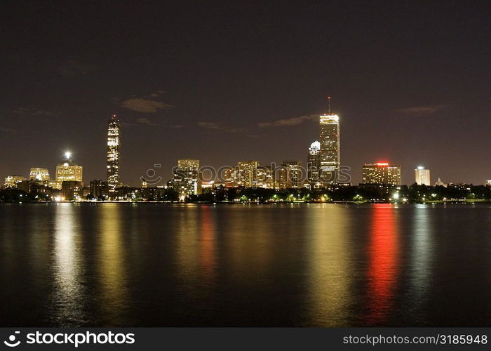 Buildings at the waterfront lit up at night, Boston, Massachusetts, USA