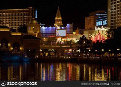 Buildings at the waterfront lit up at night, Las Vegas, Nevada, USA
