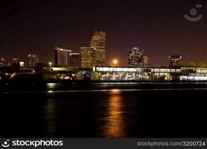 Buildings at the waterfront lit up at night, Miami, Florida, USA