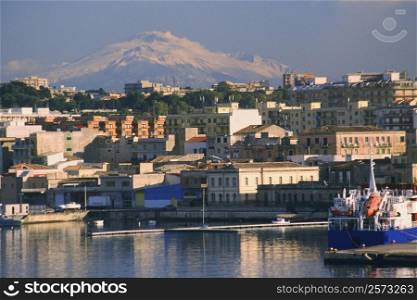 Buildings at the waterfront, Mt Etna, Siracusa, Sicily, Italy