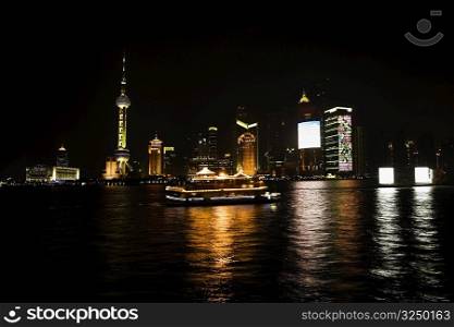 Buildings at the waterfront, Oriental Pearl Tower, Huangpu River, Lujiazui, The Bund, Shanghai, China