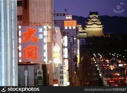 Buildings illuminated at night, Himeji, Japan