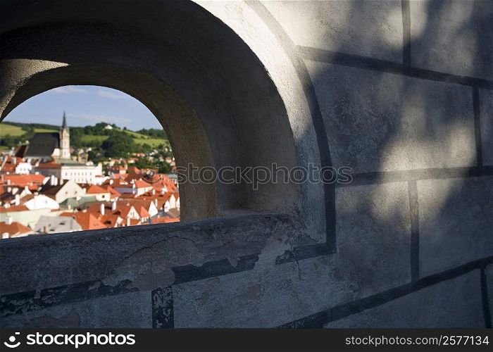 Buildings in a city seen through an arch, Prague, Czech Republic