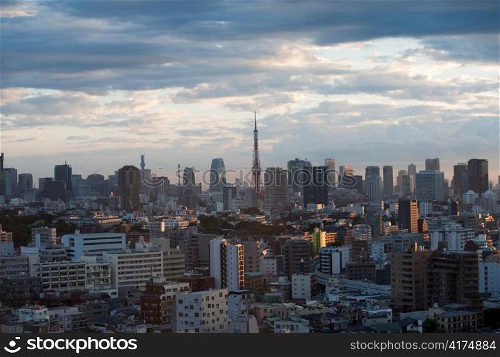 Buildings in a city with Tokyo Tower in the background, Tokyo, Japan