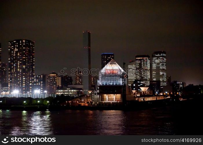Buildings lit up at night at Port of Tokyo, Tokyo, Japan