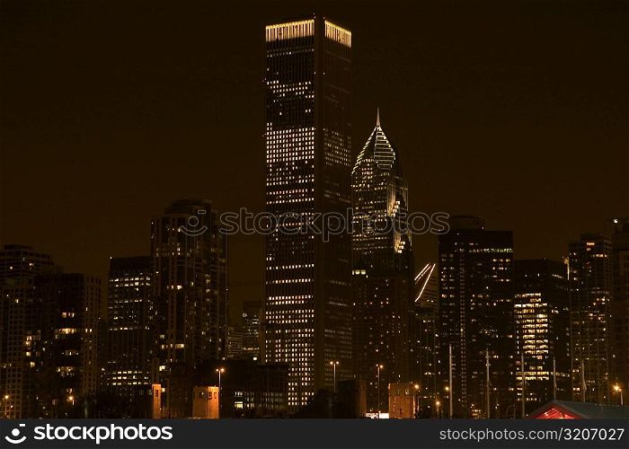 Buildings lit up at night, Chicago, Illinois, USA