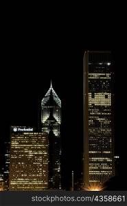 Buildings lit up at night, Chicago, Illinois, USA