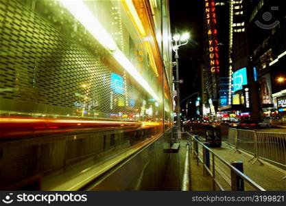 Buildings lit up at night in a city, Times Square, Manhattan, New York City, New York State, USA