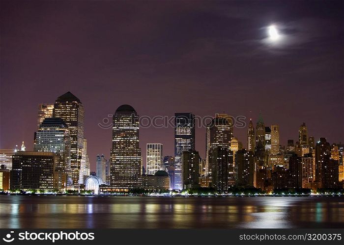 Buildings lit up at night, New York City, New York State, USA