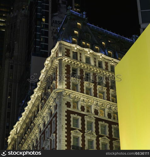 Buildings lit up at night, New York City, New York State, USA