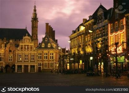 Buildings lit up at night, Town Square, Netherlands