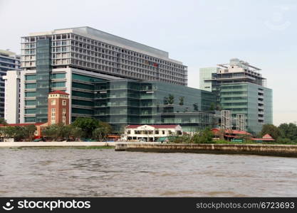 Buildings on the bank of Chao Phraya river in Bangkok, Thailand