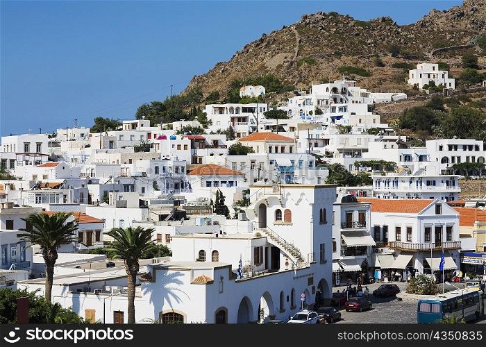 Buildings on the base of a mountain, Patmos, Dodecanese Islands, Greece