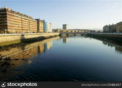 Buildings on the both sides of a river, Spain