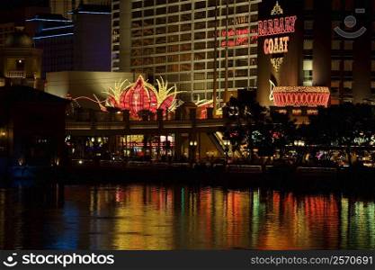 Buildings on waterfront lit up at night, Las Vegas, Nevada, USA
