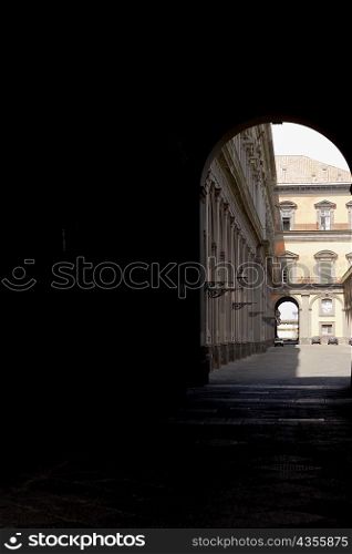 Buildings viewed through an archway, Naples, Naples Province, Campania, Italy