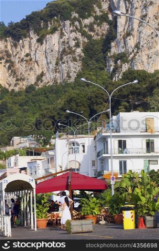 Buildings with a mountain in the background, Capri, Campania, Italy