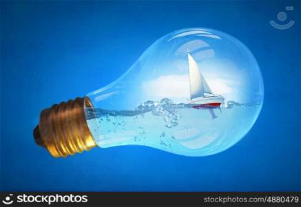 Bulb with boat inside. Concept of ecology with light bulb filled with water and boat floating inside