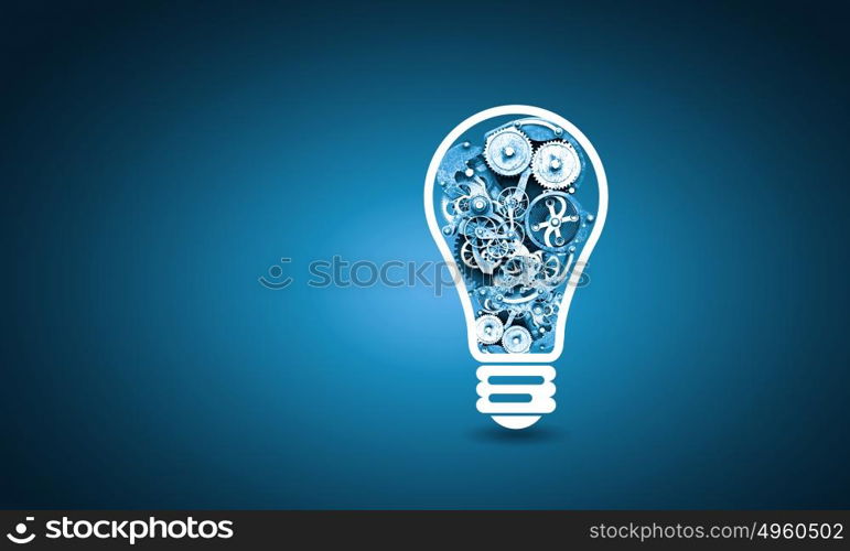 Bulb with gears. Conceptual image of light bulb with cogwheels inside