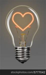 bulb with glowing red heart inside of it, creativity concept