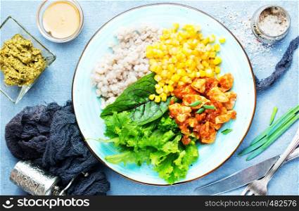 Bulgur porridge with chicken fillet and vegetables. Diet food