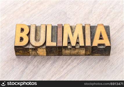 bulimia - word abstract in vintage letterpress wood type printing blocks