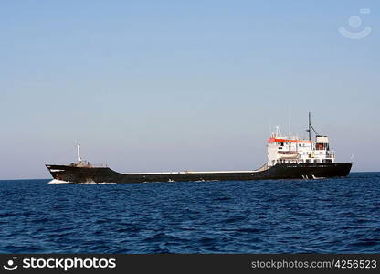 Bulk-carrier ship moving in the sea