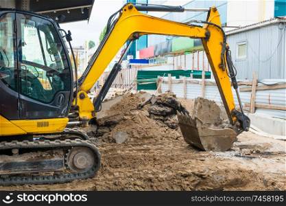 Bulldozer at construction site area building a road