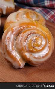 bun of pumpkin with cinnamon in the form of snails closeup