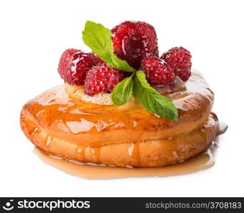 Bun with raspberry and pineapple isolated on a white background