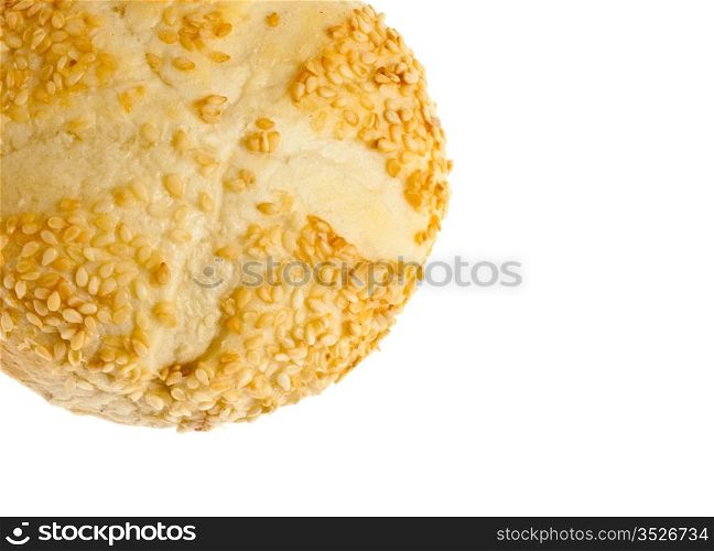 bun with sesame seeds closeup isolated on white background