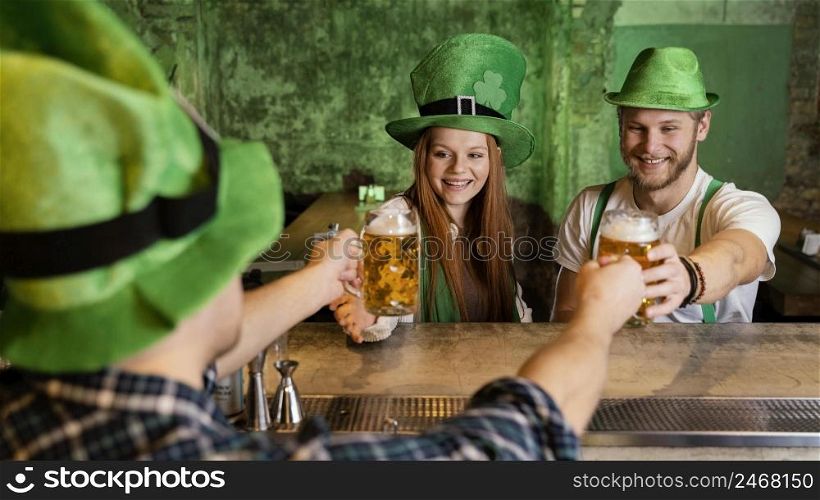 bunch friends celebrating st patrick s day bar