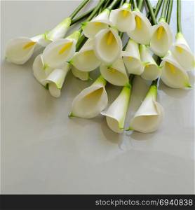 Bunch of arum lily on white background, white flower from clay with yellow stamen, handmade artwork from clay art