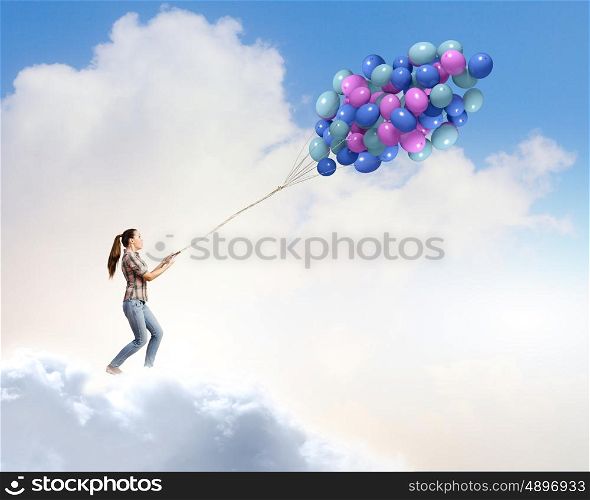 Bunch of balloons. Young pretty woman with big bunch of colorful balloons