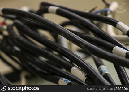 Bunch of black cables closeup