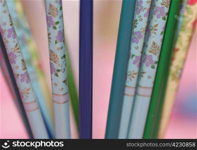 Bunch of chopsticks on abstract background