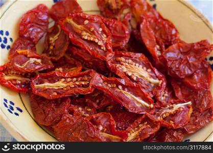 Bunch of dried tomatoes typical from south of italy