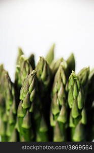 Bunch of fresh asparagus on wooden table