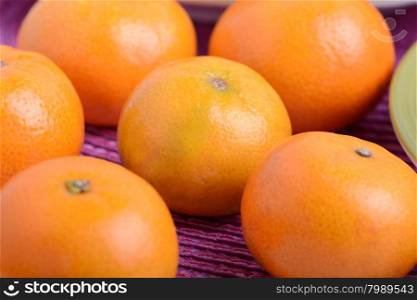 Bunch of fresh mandarin oranges, health food concept
