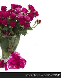 bunch of fresh mauve roses in glass vase with heart gift box isolated on white background. bunch of fresh mauve roses