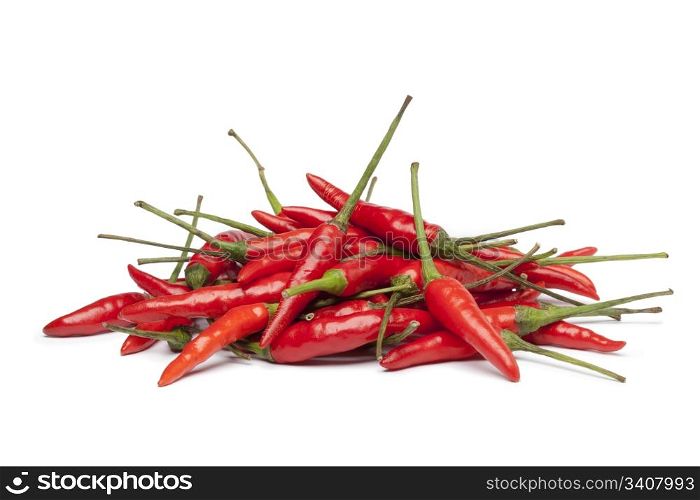 Bunch of fresh tabasco peppers on white background