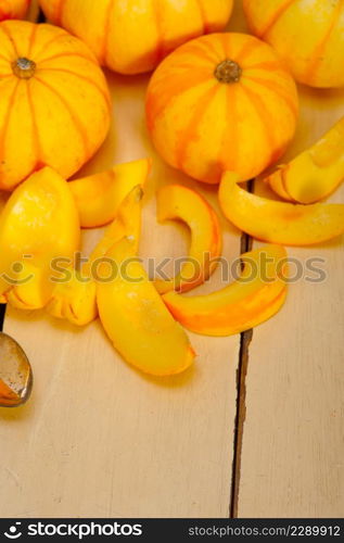 bunch of fresh yellow pumpkins just collected from garden